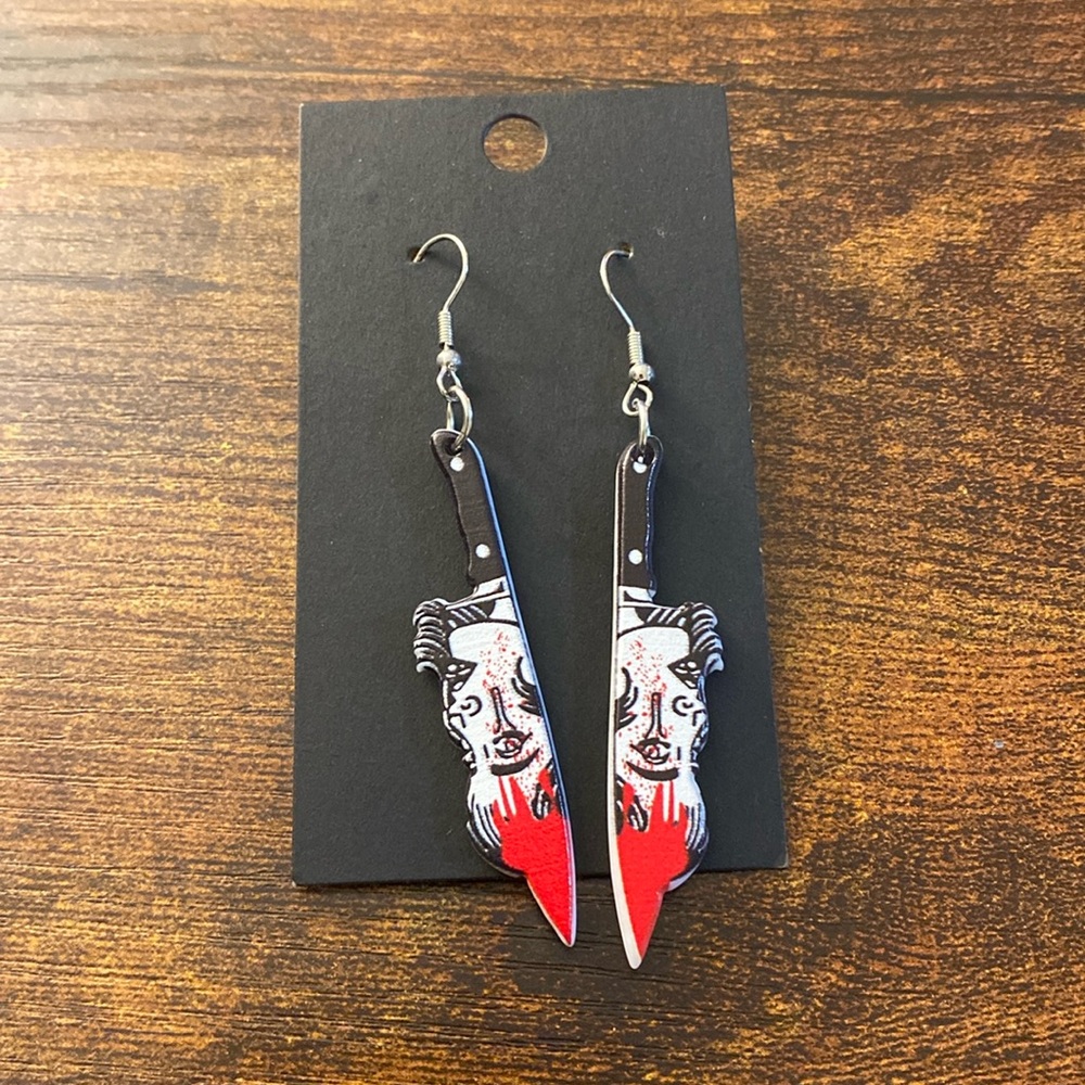 Graphic dagger with blood design earrings